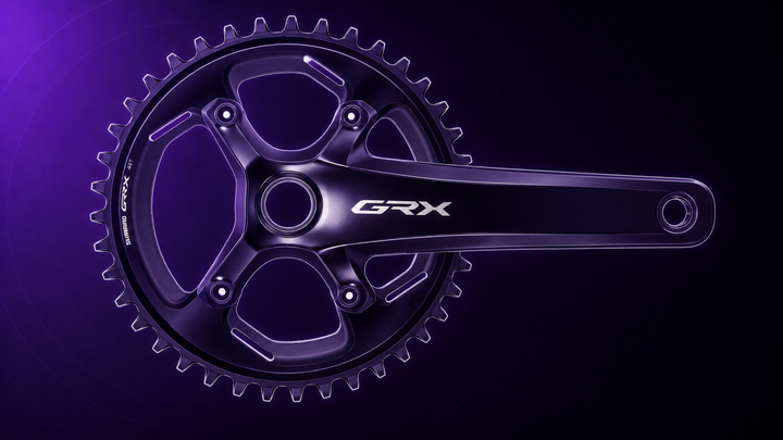 Shimano GRX Kurbel mit 46-Zähne-Kettenblatt als dunkle violette technische Tretmaschine-Illustration